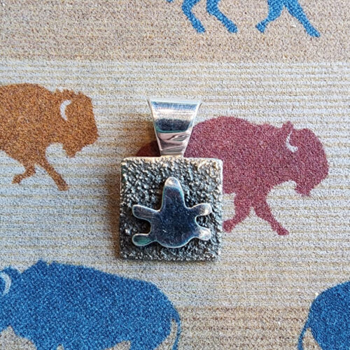 20260210_165143 Alex Sanchez Mini Pendant, petroglyph dragonfly