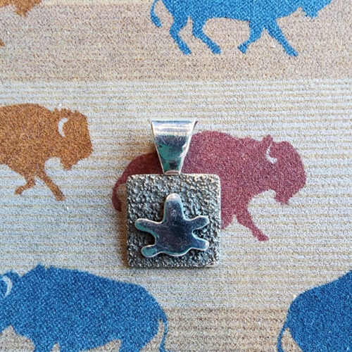 20260210_165206 Alex Sanchez Mini Pendant, petroglyph dragonfly