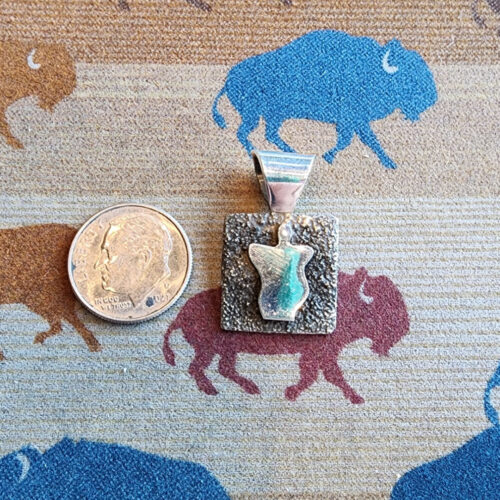 20260210_165228 Alex Sanchez Mini Pendant, petroglyph man