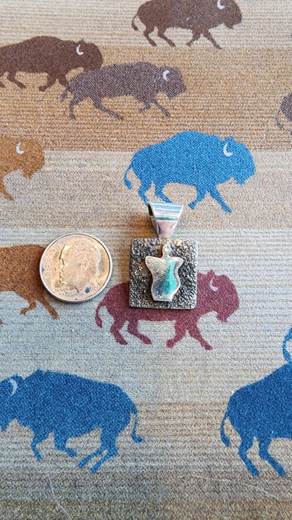 20260210_165228 Alex Sanchez Mini Pendant, petroglyph man