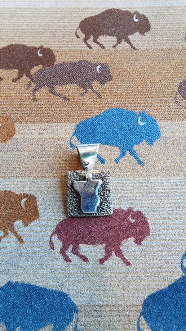 20260210_165240 Alex Sanchez Mini Pendant, petroglyph man