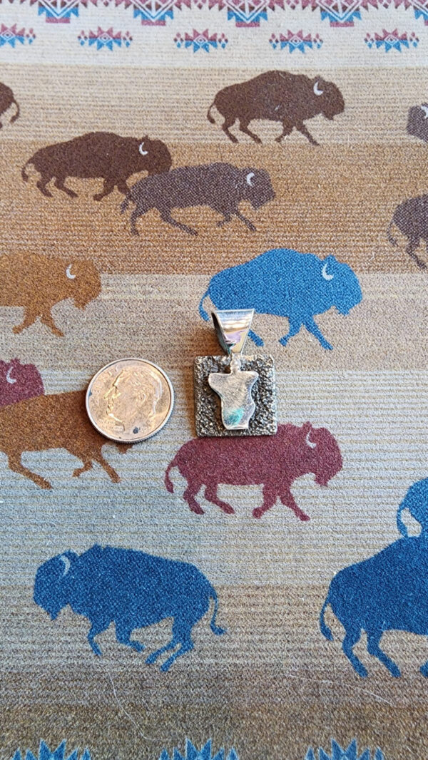 20260210_165245 Alex Sanchez Mini Pendant, petroglyph man