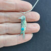 Lucille Platero Crow Pendant with Turquoise
